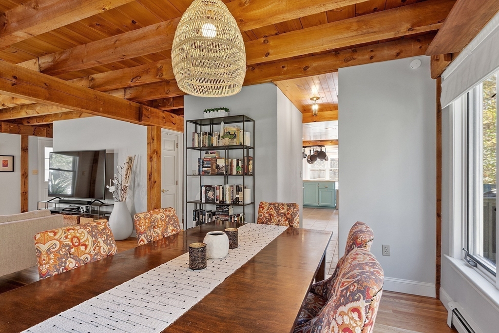 55 Carroll Road Grafton, MA 01536 - Photo 11 of 40 a living room with furniture bathtub and a table