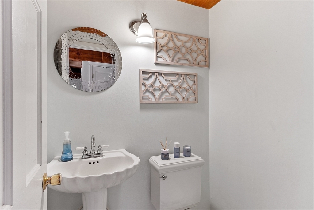 55 Carroll Road Grafton, MA 01536 - Photo 13 of 40 a bathroom with a sink and a mirror