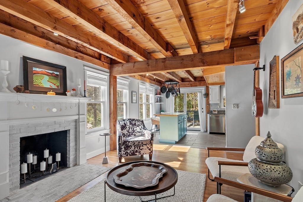 55 Carroll Road Grafton, MA 01536 - Photo 16 of 40 a living room with furniture and a fireplace