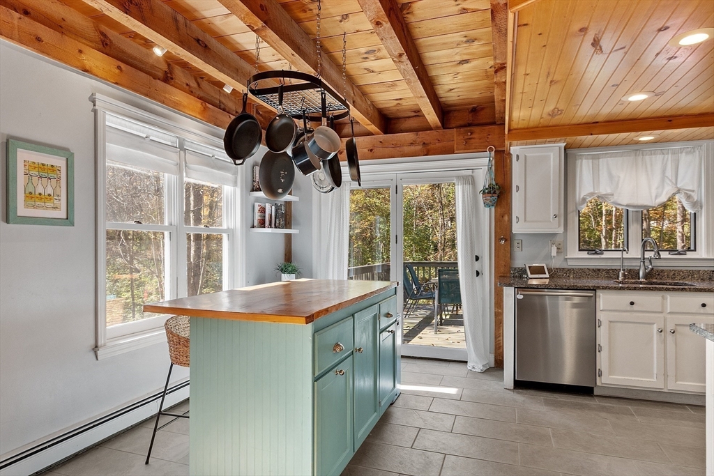 55 Carroll Road Grafton, MA 01536 - Photo 17 of 40 a kitchen with stainless steel appliances granite countertop a sink and a refrigerator