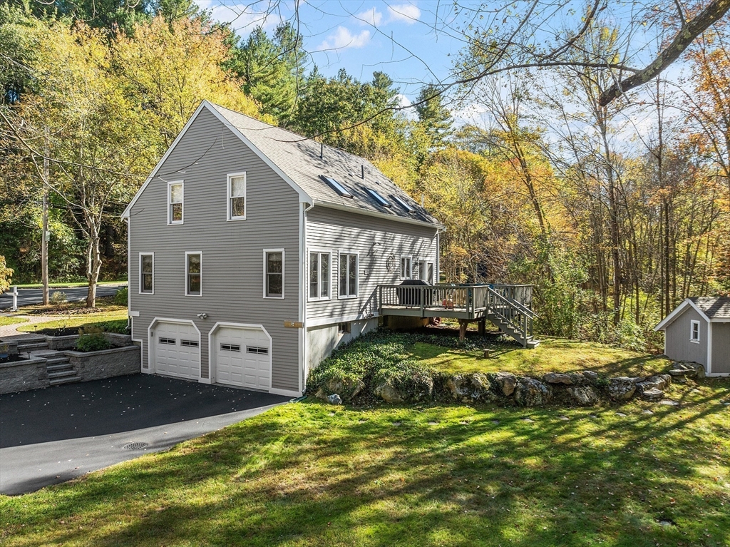 55 Carroll Road Grafton, MA 01536 - Photo 2 of 40 a view of a house with backyard