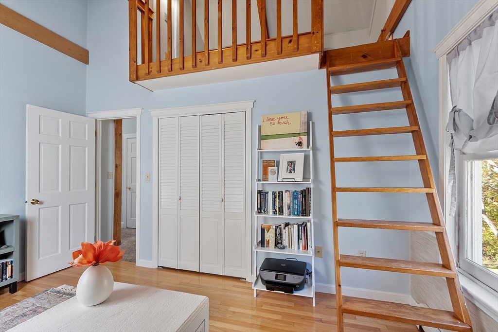 55 Carroll Road Grafton, MA 01536 - Photo 31 of 40 a view of walk in closet with clothes and shoes