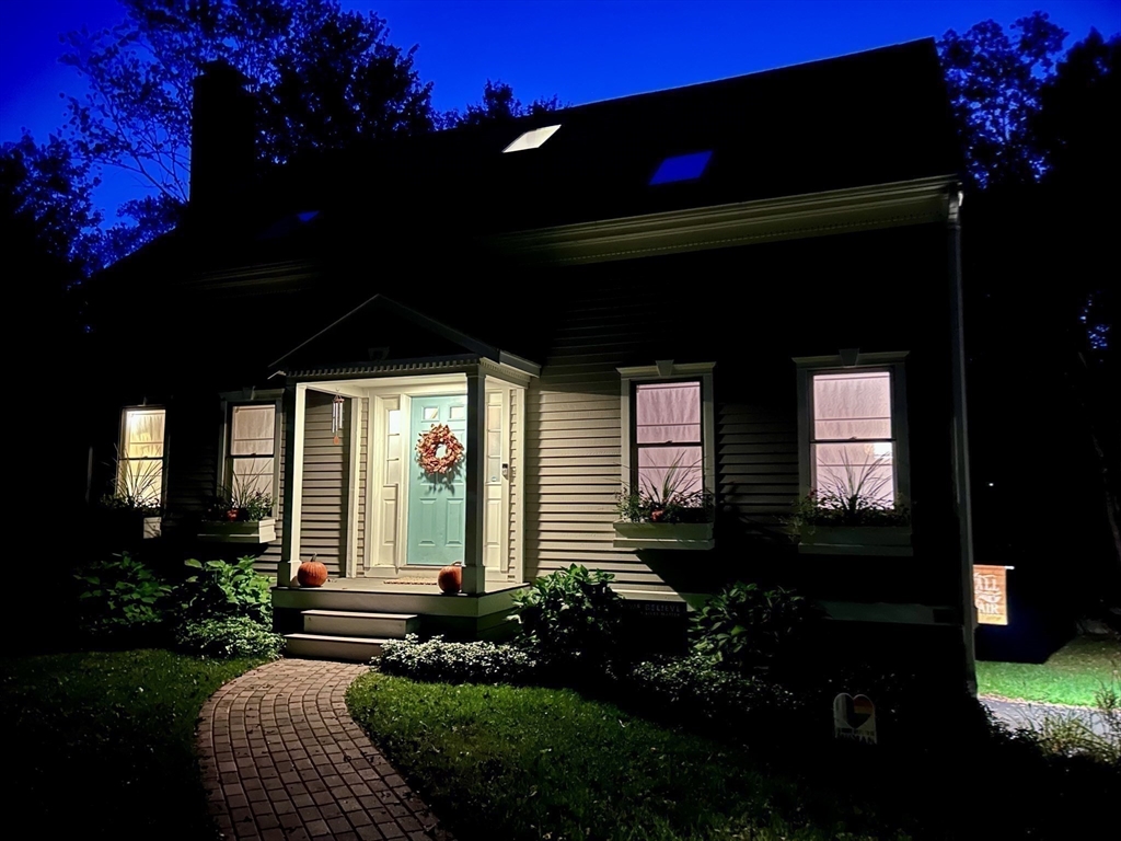 55 Carroll Road Grafton, MA 01536 - Photo 39 of 40 a front view of a house with a yard