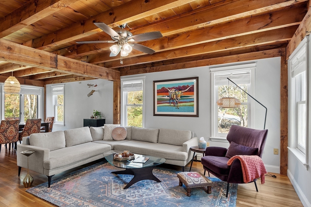 55 Carroll Road Grafton, MA 01536 - Photo 9 of 40 a living room with furniture and a large window