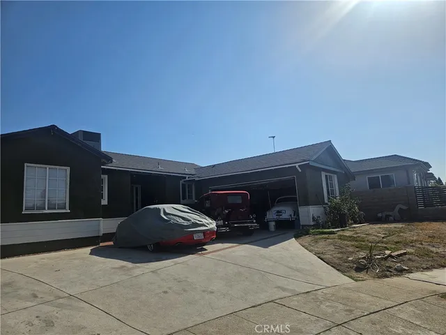 a car parked in front of a house