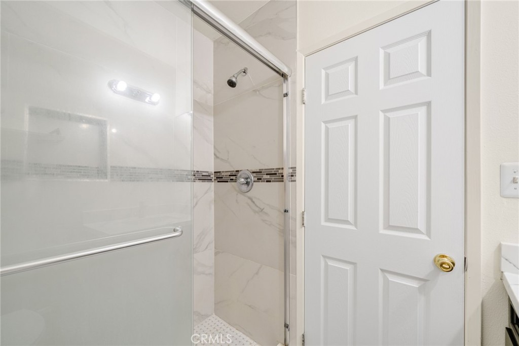 13223 3rd Street Chino, CA 91710 - Photo 6 of 15 a bathroom with a shower