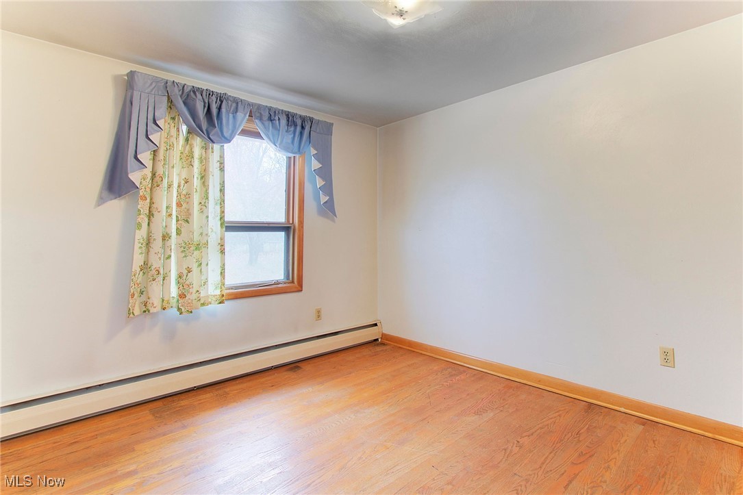 5334 Ridge Avenue Southeast Canton, OH 44707 - Photo 30 of 47 Bedroom 3 with hardwood floors.