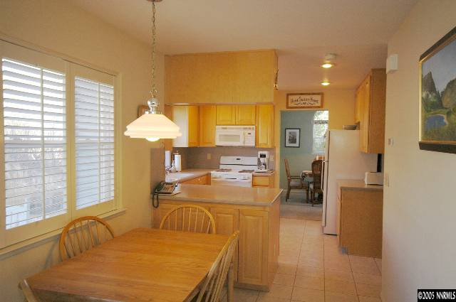 2287 Ridgeview Drive Reno, NV 89519 - Photo 7 of 9 a view of a dining room with furniture and a window