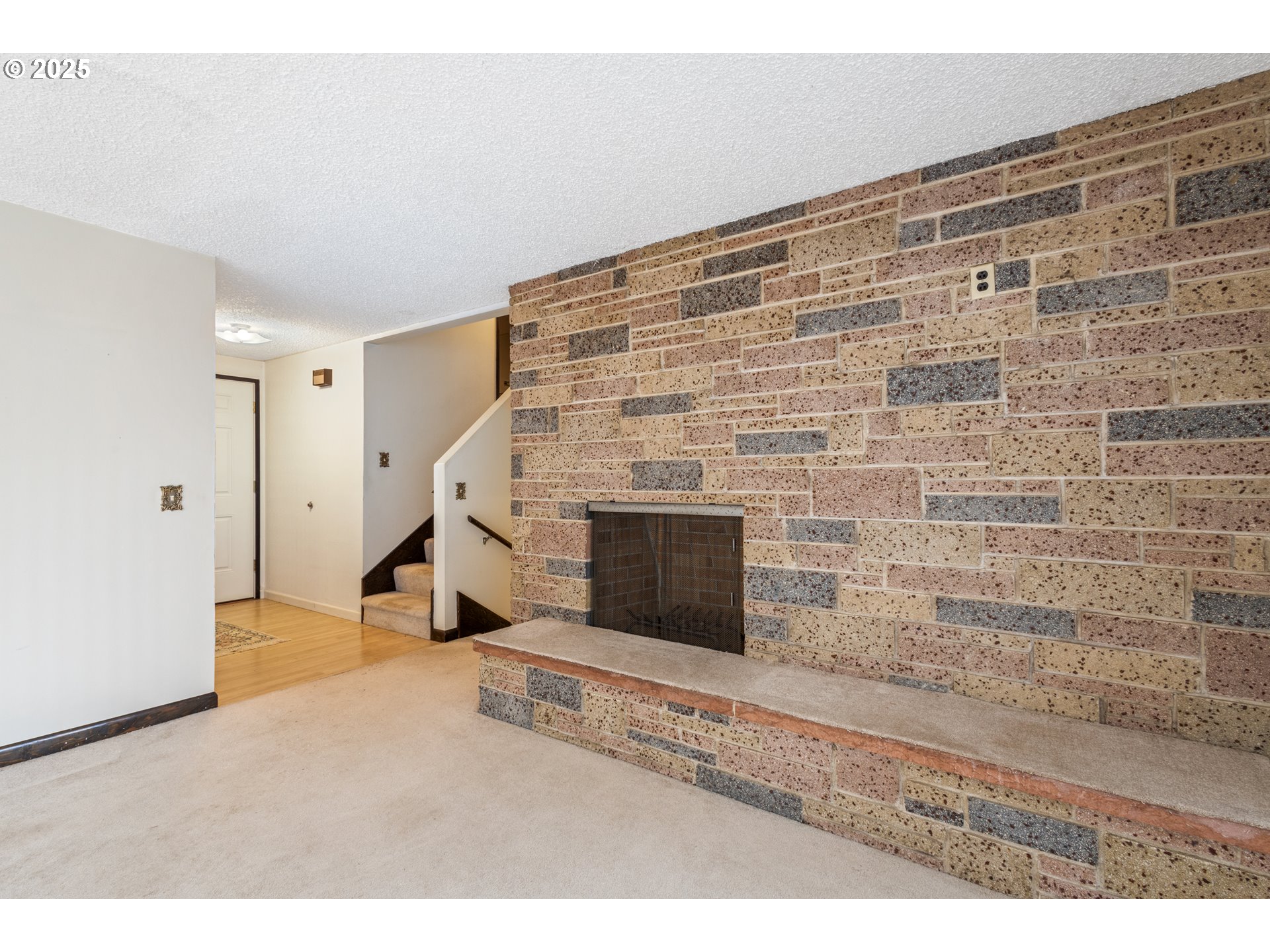 5673 Southwest Old Highway 47 Gaston, OR 97119 - Photo 16 of 33 a view of an empty room with a fireplace