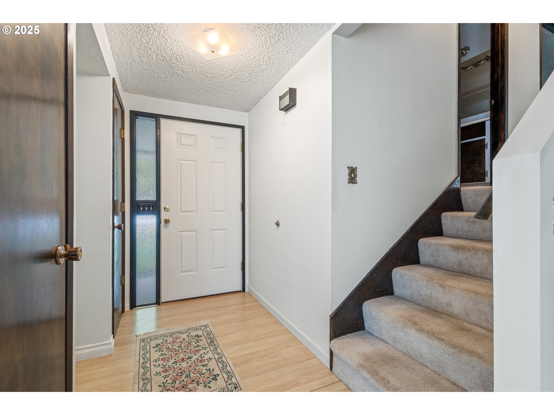 5673 Southwest Old Highway 47 Gaston, OR 97119 - Photo 27 of 33 a view of an entryway with wooden floor