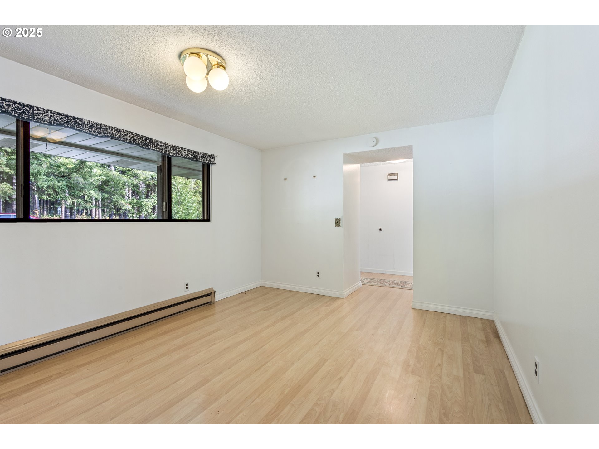 5673 Southwest Old Highway 47 Gaston, OR 97119 - Photo 28 of 33 a view of an empty room with a window