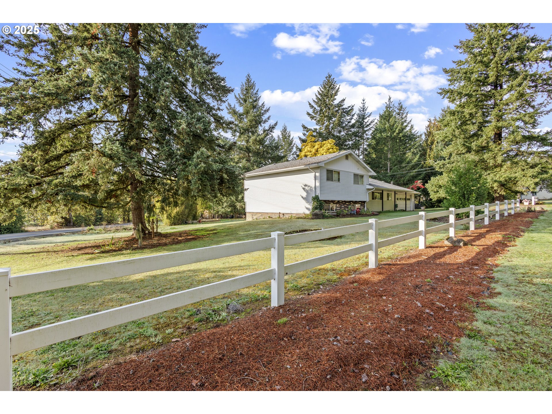 5673 Southwest Old Highway 47 Gaston, OR 97119 - Photo 3 of 33 a view of a house with a yard