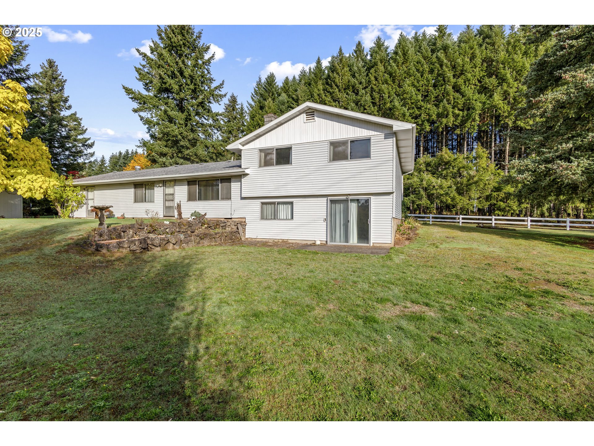 5673 Southwest Old Highway 47 Gaston, OR 97119 - Photo 9 of 33 a house view with a garden space