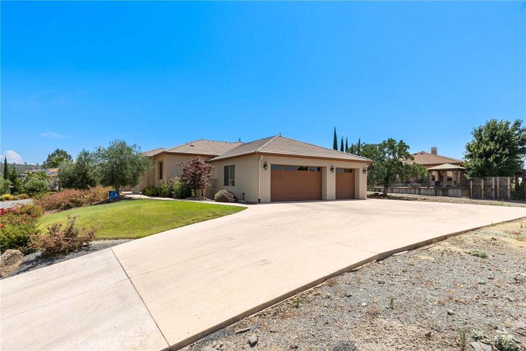 3265 Siena Ridge Loop Chico, CA 95928 - Photo 18 of 19 a front view of a house with a yard