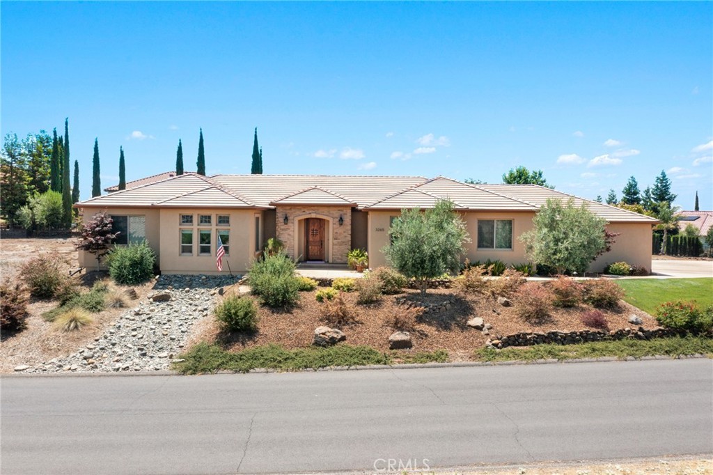 3265 Siena Ridge Loop Chico, CA 95928 - Photo 2 of 19 a front view of a house with a yard