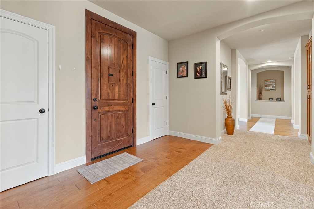 3265 Siena Ridge Loop Chico, CA 95928 - Photo 4 of 19 a view of a livingroom with wooden floor and closet area