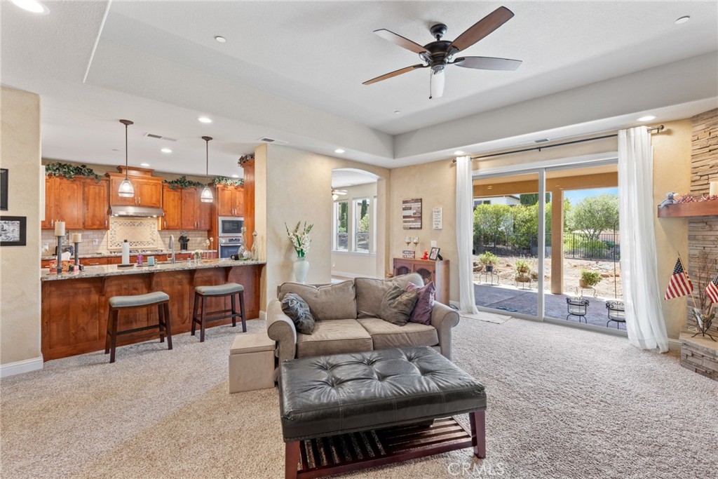 3265 Siena Ridge Loop Chico, CA 95928 - Photo 7 of 19 a living room with furniture and a large window