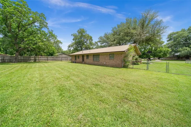 a view of an outdoor space and a yard