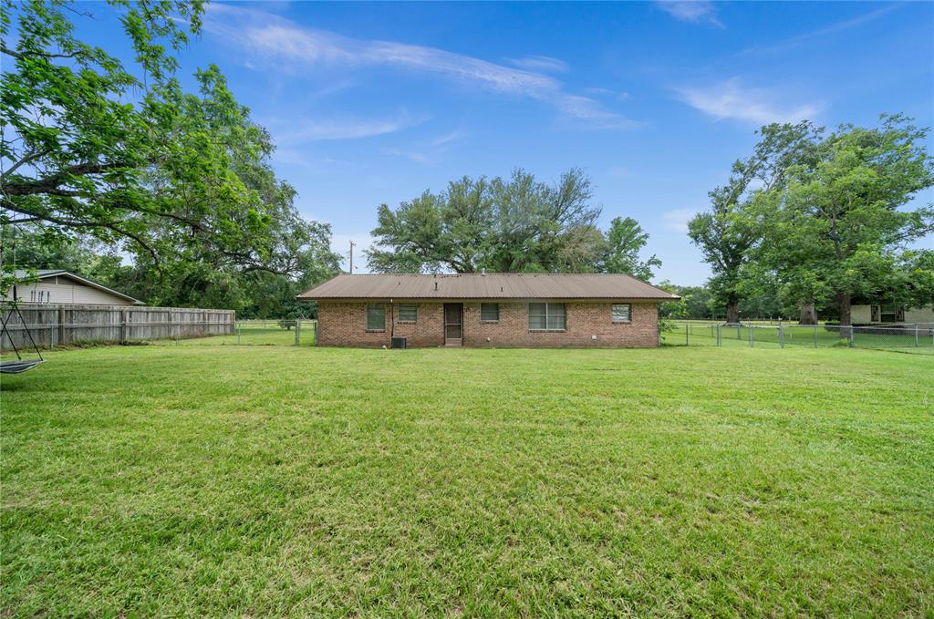6753 Murphy Street Murchison, TX 75778 - Photo 23 of 24 a view of a house with a yard