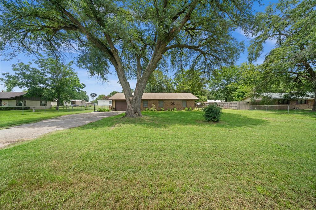 6753 Murphy Street Murchison, TX 75778 - Photo 24 of 24 a view of a house with a yard