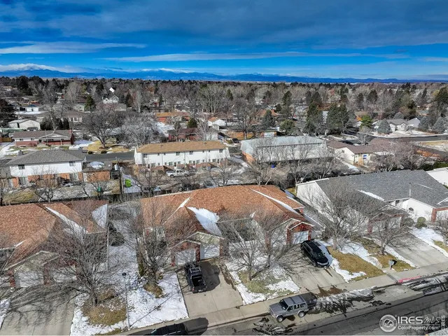 a view of a building with a yard