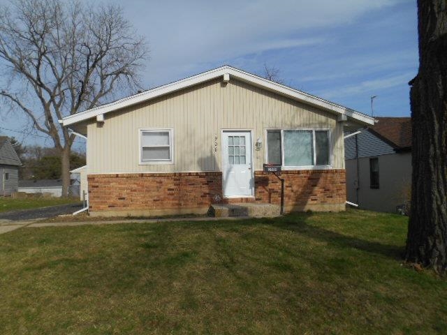 1908 Ridgeland Road Rockford, IL 61108 - Photo 2 of 20 a view of a house with a yard