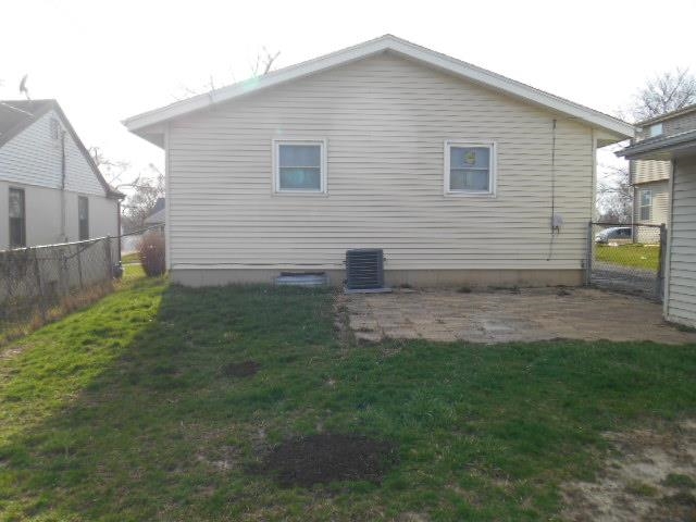 1908 Ridgeland Road Rockford, IL 61108 - Photo 8 of 20 a view of back yard of the house