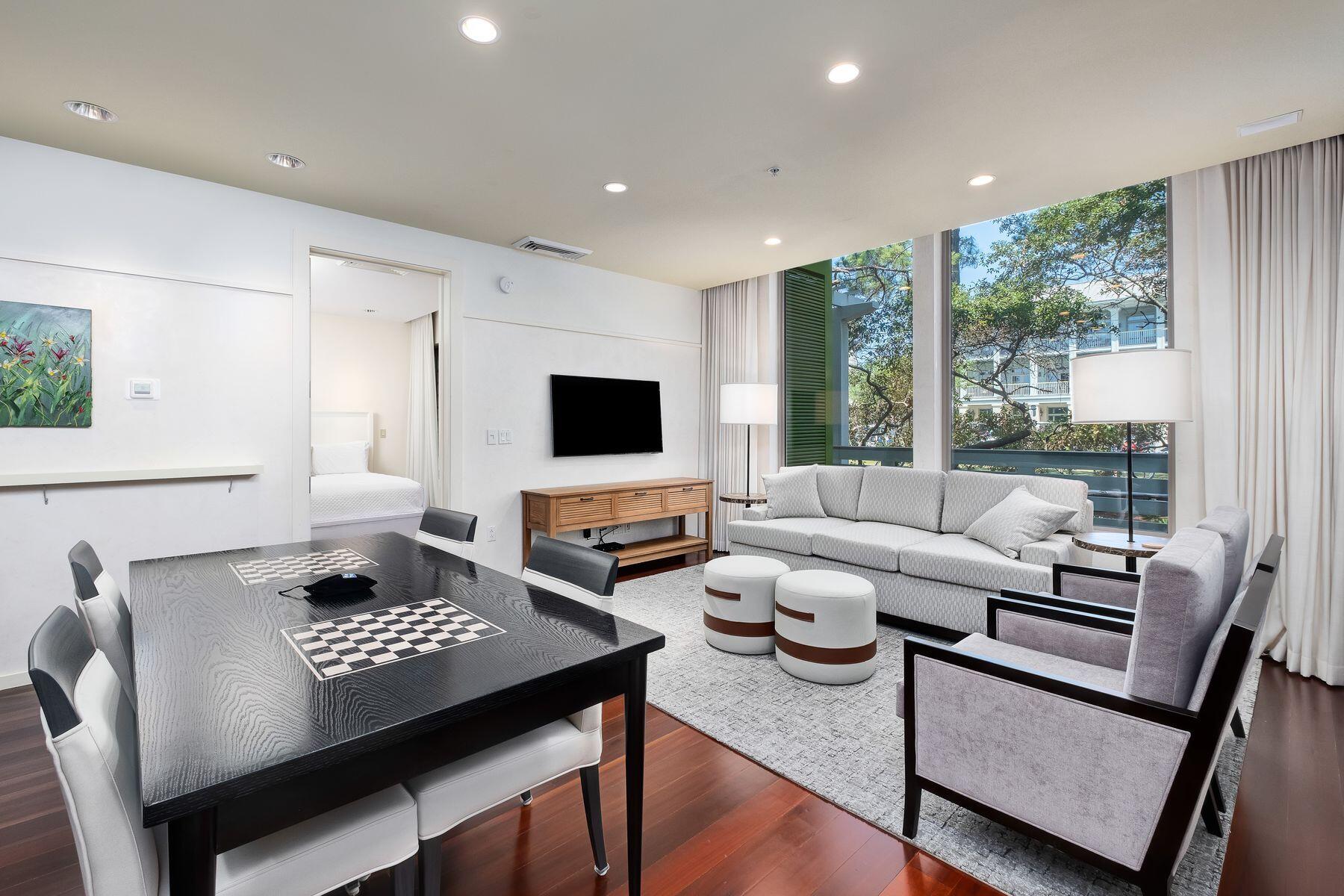29 Goldenrod Circle, Unit 3018 Santa Rosa Beach, FL 32459 - Photo 1 of 22 a living room with furniture and a flat screen tv