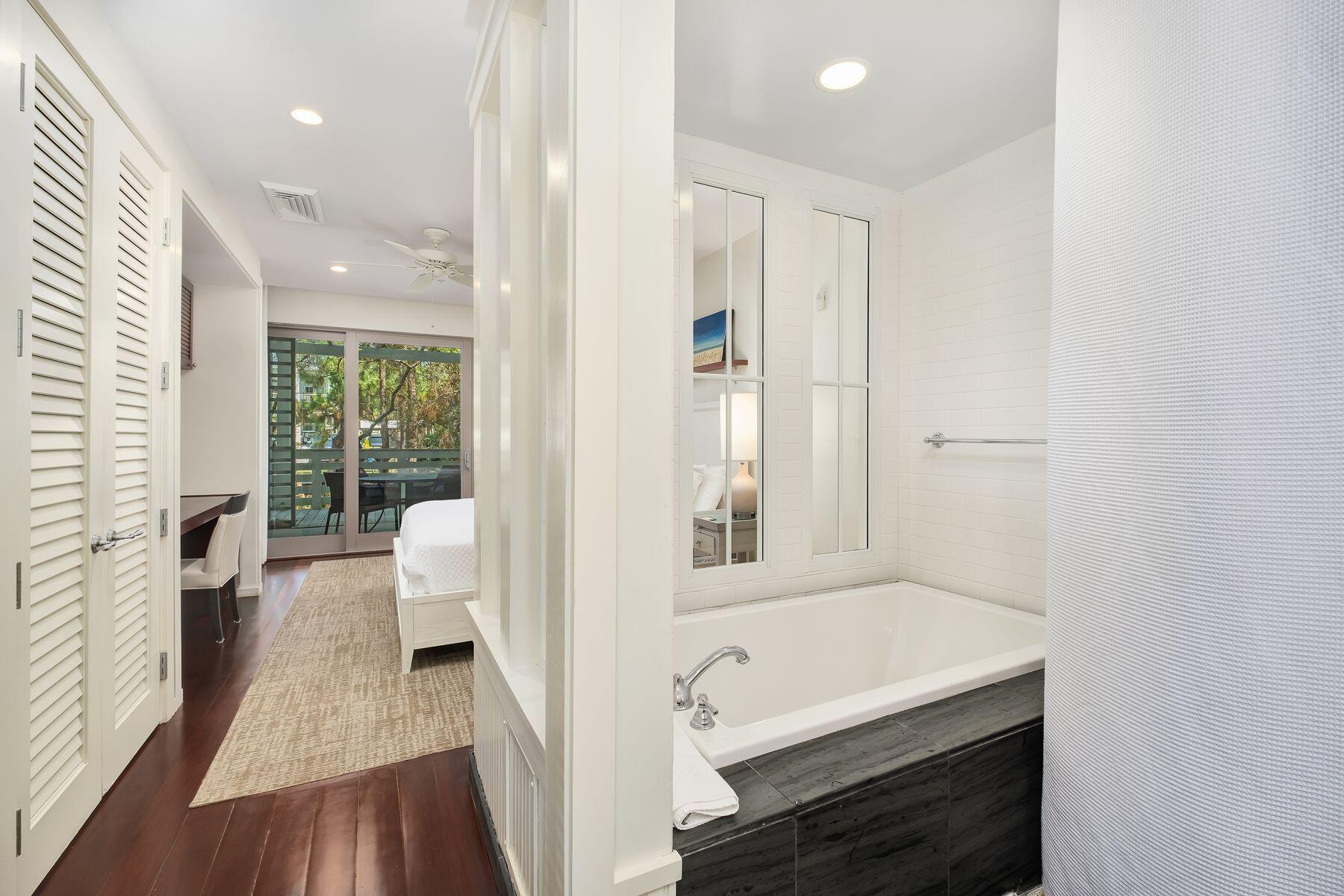 29 Goldenrod Circle, Unit 3018 Santa Rosa Beach, FL 32459 - Photo 13 of 22 a bathroom with a bathtub and a sink