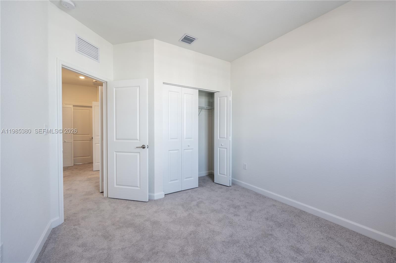 13380 Southwest 287th Terrace Homestead, FL 33033 - Photo 20 of 21 an empty room with closet area