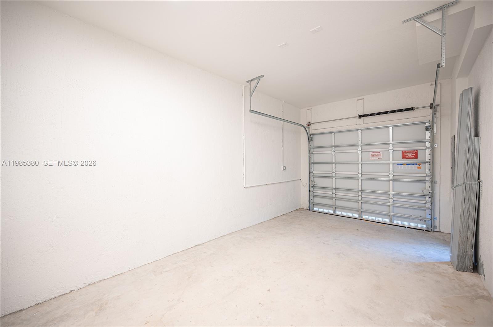 13380 Southwest 287th Terrace Homestead, FL 33033 - Photo 9 of 21 a view of a garage