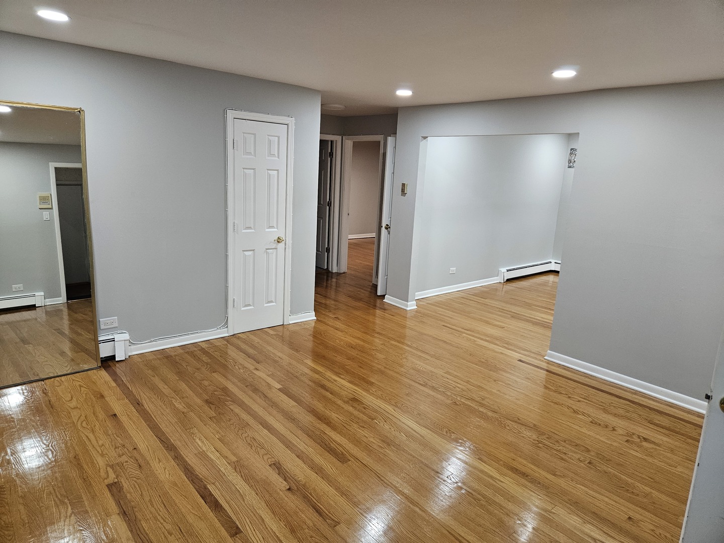 2348 West 111th Street, Unit 2 Chicago, IL 60643 - Photo 3 of 23 a view of an empty room with wooden floor