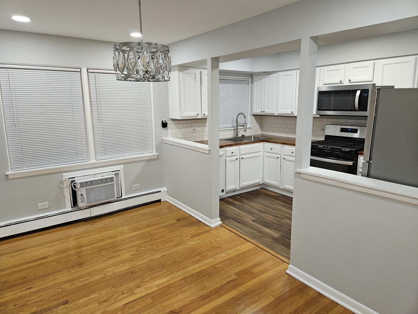 2348 West 111th Street, Unit 2 Chicago, IL 60643 - Photo 10 of 23 a kitchen with stainless steel appliances a refrigerator and microwave