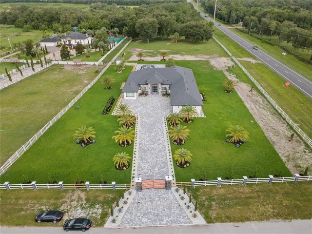 an aerial view of a pool