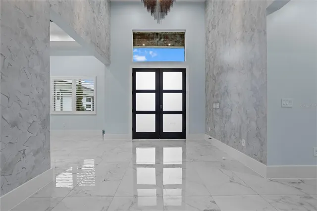 a view of a hallway with a window