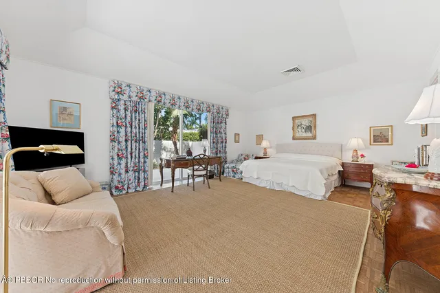 a bedroom with furniture and a couch