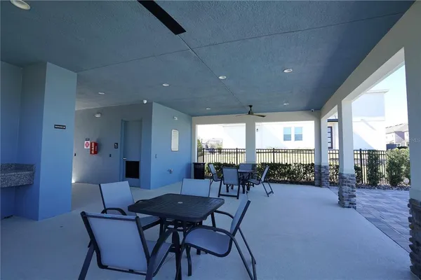 a view of a swimming pool with a patio