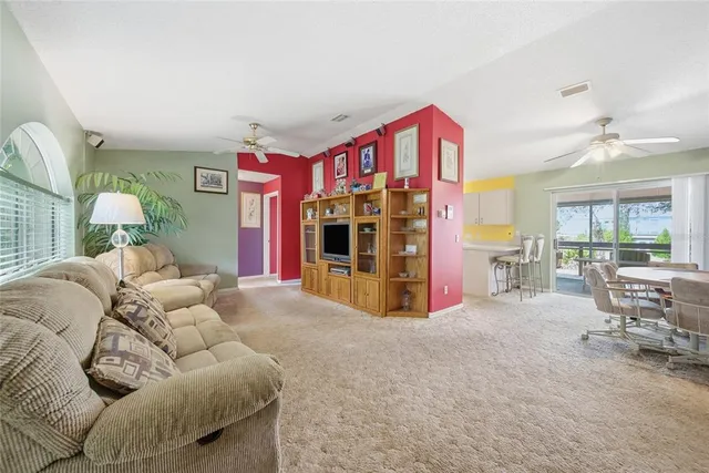 a bed room with furniture and a window