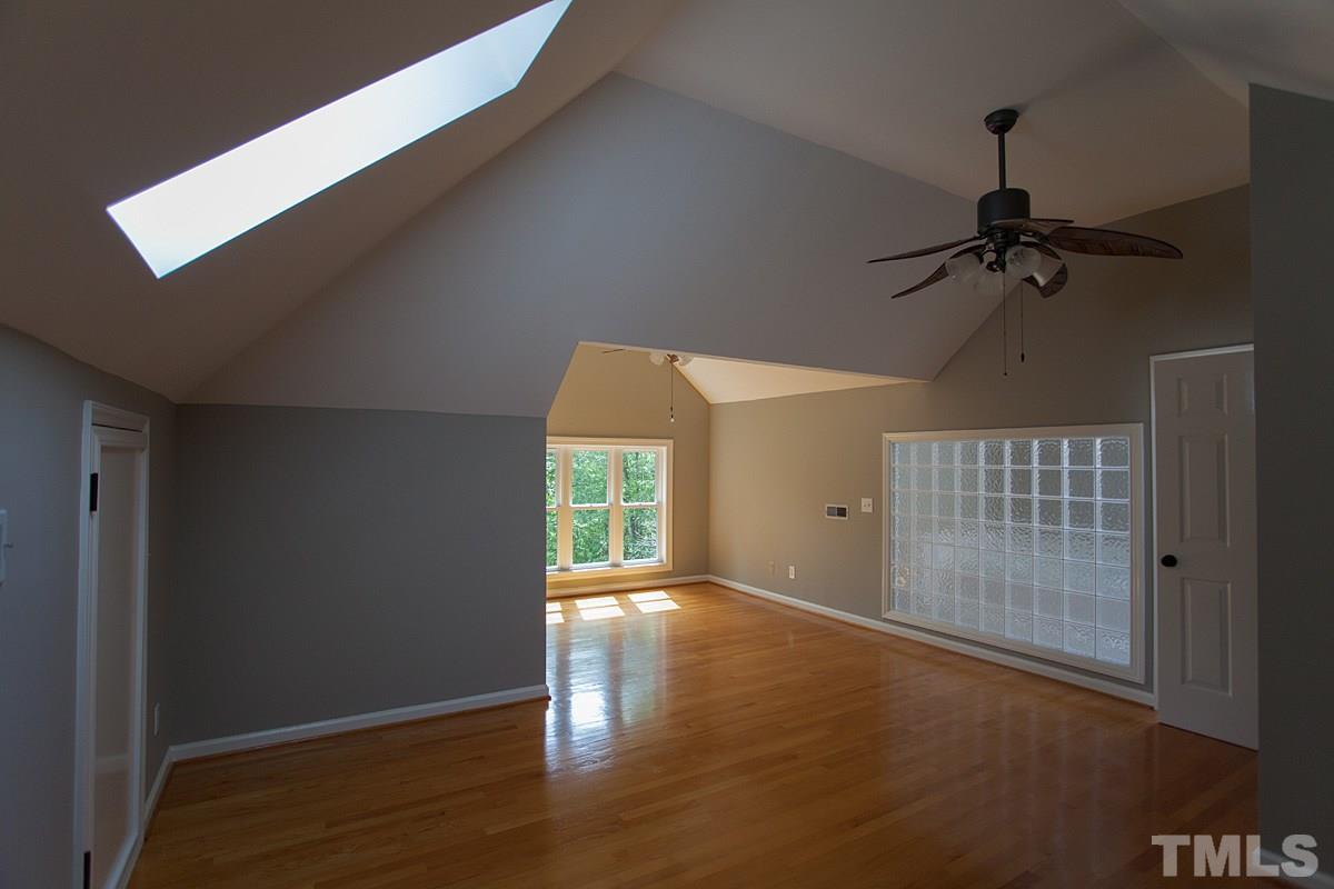 1781 Concord Church Road Roxboro, NC 27574 - Photo 22 of 25 a view of a livingroom with a ceiling fan and window