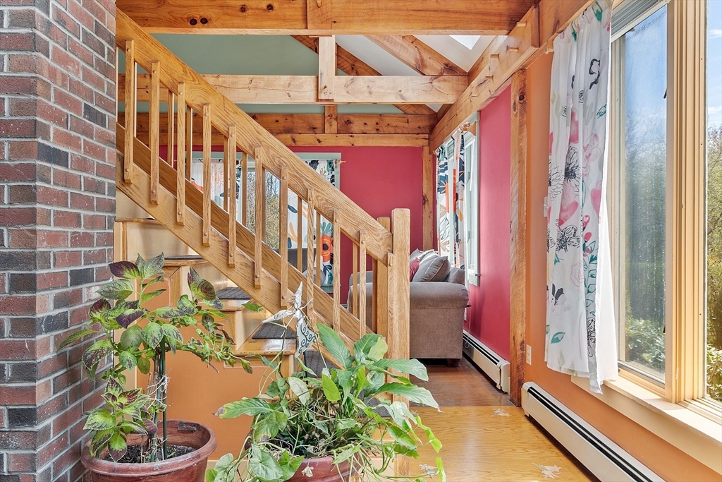31 Dutton Road Pelham, NH 03076 - Photo 13 of 36 a view of balcony with a potted plant