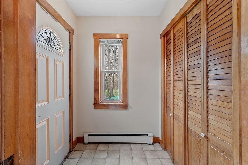 31 Dutton Road Pelham, NH 03076 - Photo 24 of 36 a view of an entryway with a window