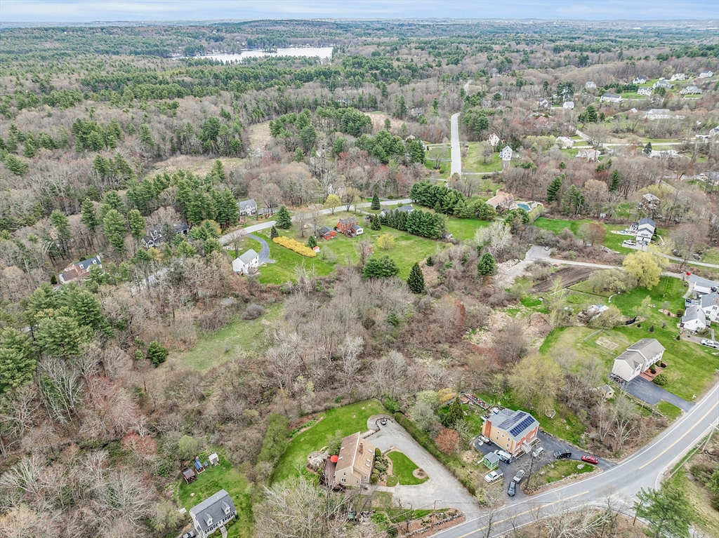 31 Dutton Road Pelham, NH 03076 - Photo 36 of 36 a view of a city with tall trees