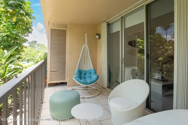 a bathroom with a toilet sink and shower