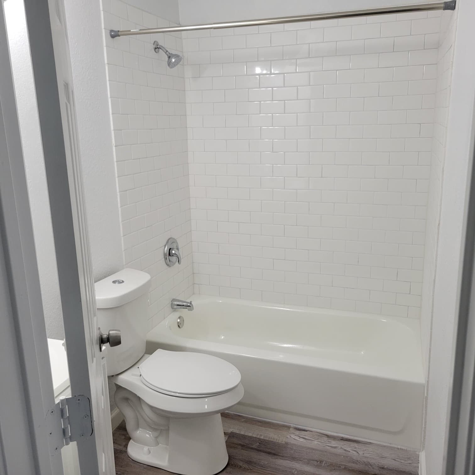 4525 Weaver Road, Unit 15 Houston, TX 77016 - Photo 11 of 17 a bathroom with a toilet and shower