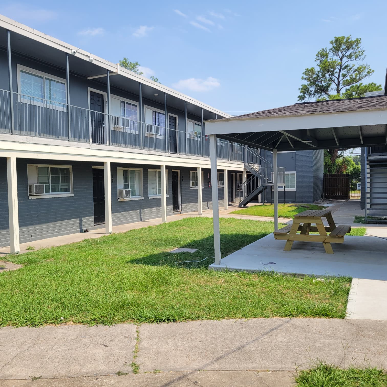 4525 Weaver Road, Unit 15 Houston, TX 77016 - Photo 16 of 17 a view of a house with a swimming pool