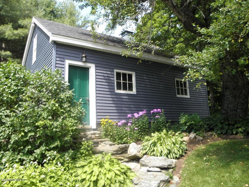 661 High St Hill Road Windsor, MA 01270 - Photo 4 of 75 a front view of a house with a yard