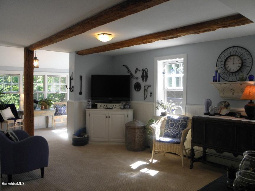 661 High St Hill Road Windsor, MA 01270 - Photo 33 of 75 a living room with furniture and a flat screen tv