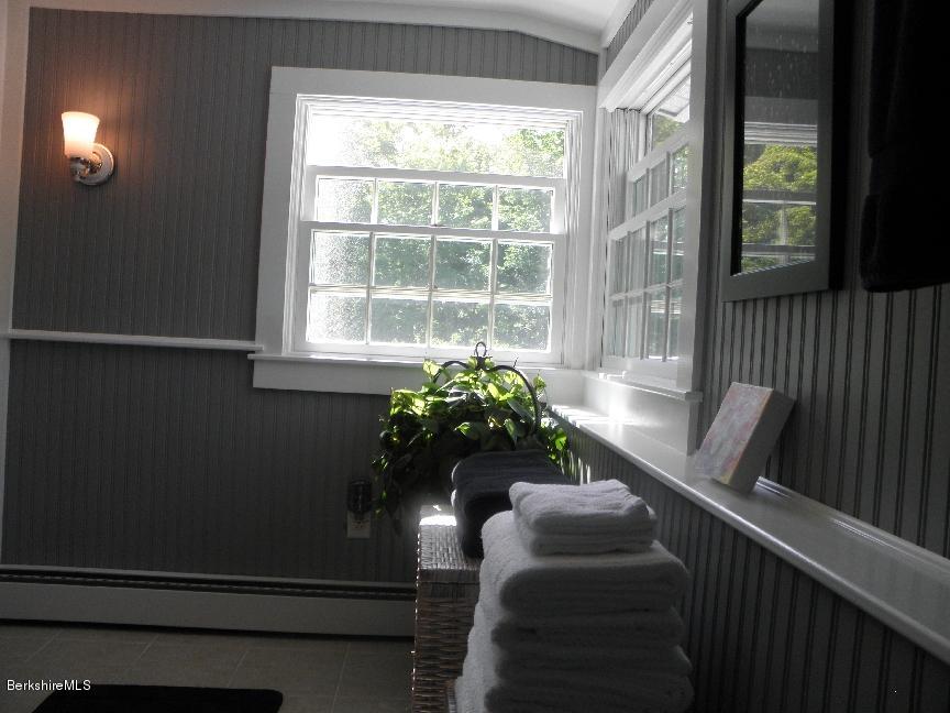 661 High St Hill Road Windsor, MA 01270 - Photo 47 of 75 a view of a balcony with chair and wooden floor