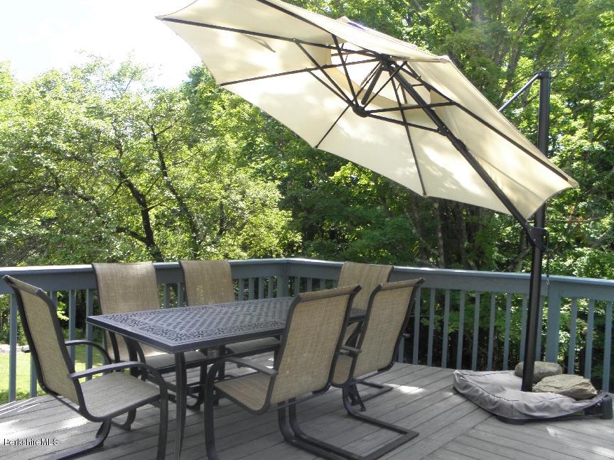 661 High St Hill Road Windsor, MA 01270 - Photo 51 of 75 a view of balcony with wooden floor and outdoor seating