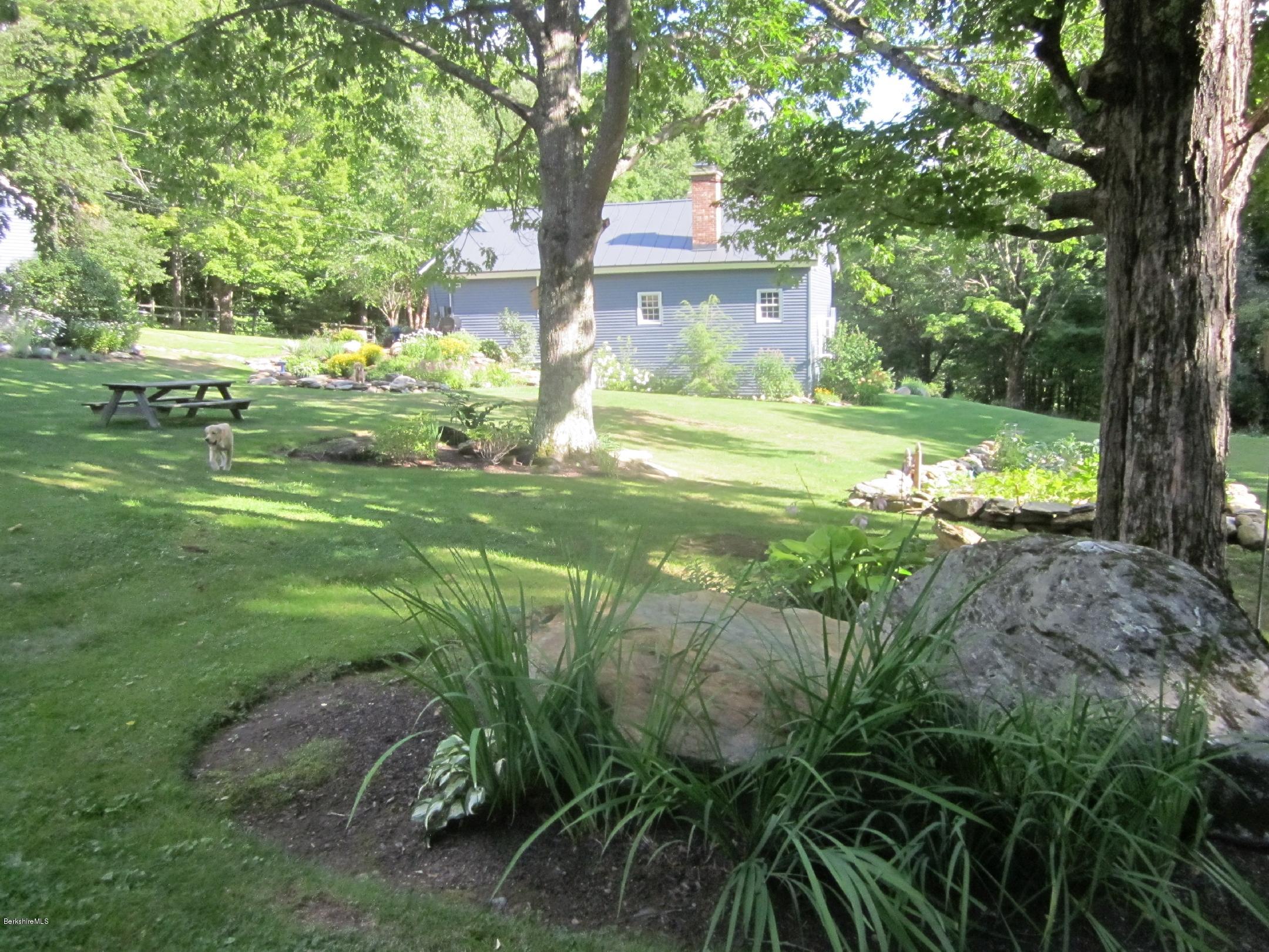 661 High St Hill Road Windsor, MA 01270 - Photo 53 of 75 a view of a house with a yard